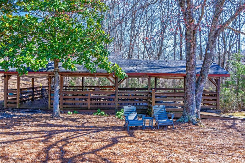 110 Rathgeb Trail Jasper, GA 30143 - Photo 25 of 62 a view of a chairs and tables in the patio