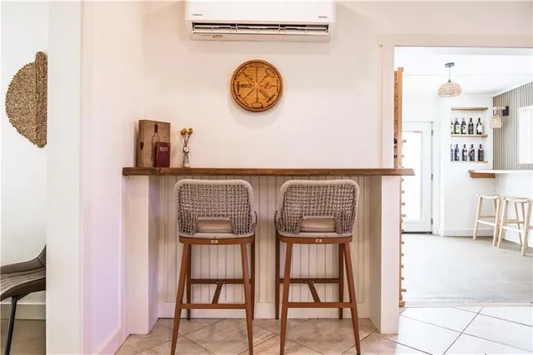 a bathroom with a bathtub and shower