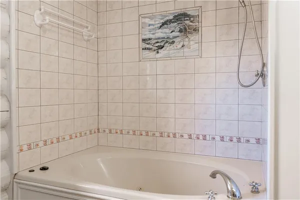 a view of a town with mountains in the background