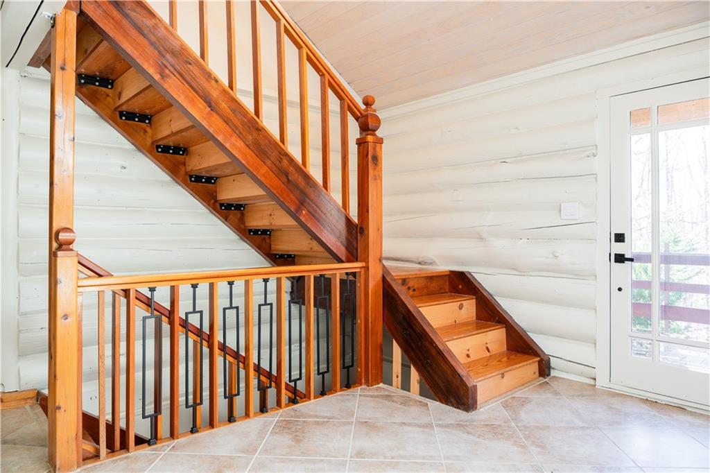 110 Rathgeb Trail Jasper, GA 30143 - Photo 47 of 62 a backyard of a house with wooden floor and stairs