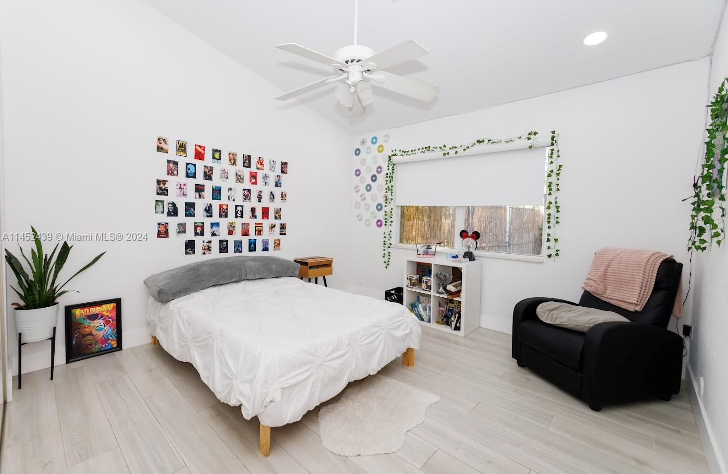 6110 Falconsgate Avenue Davie, FL 33331 - Photo 22 of 33 a bedroom with a bed couch and window