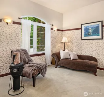 a bedroom with a bed and dresser