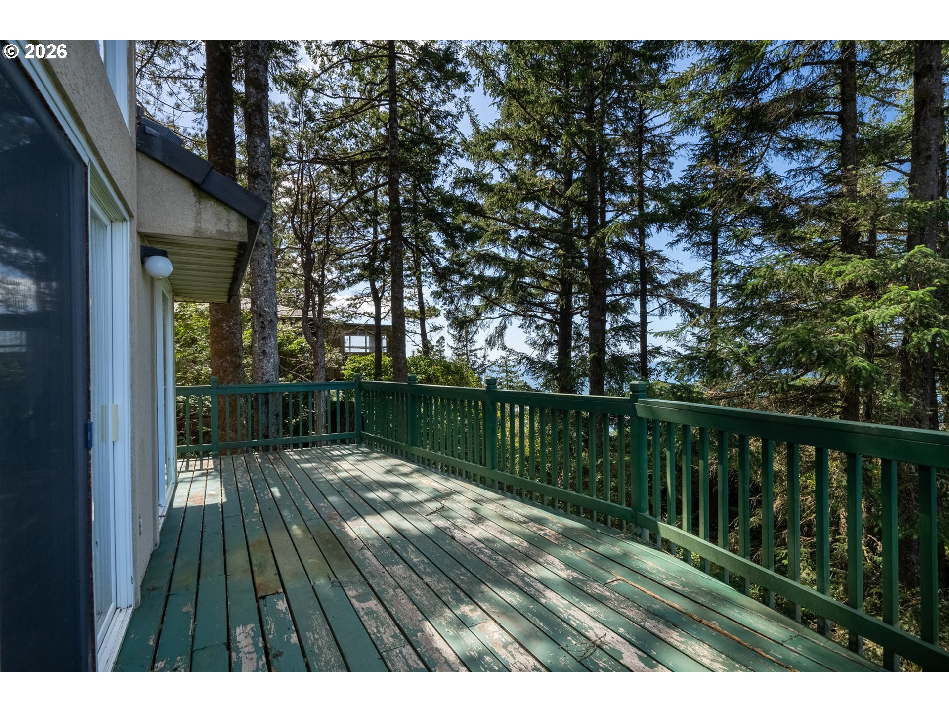 6095 Huckleberry Lane Oceanside, OR 97141 - Photo 11 of 48 a view of balcony with wooden floor