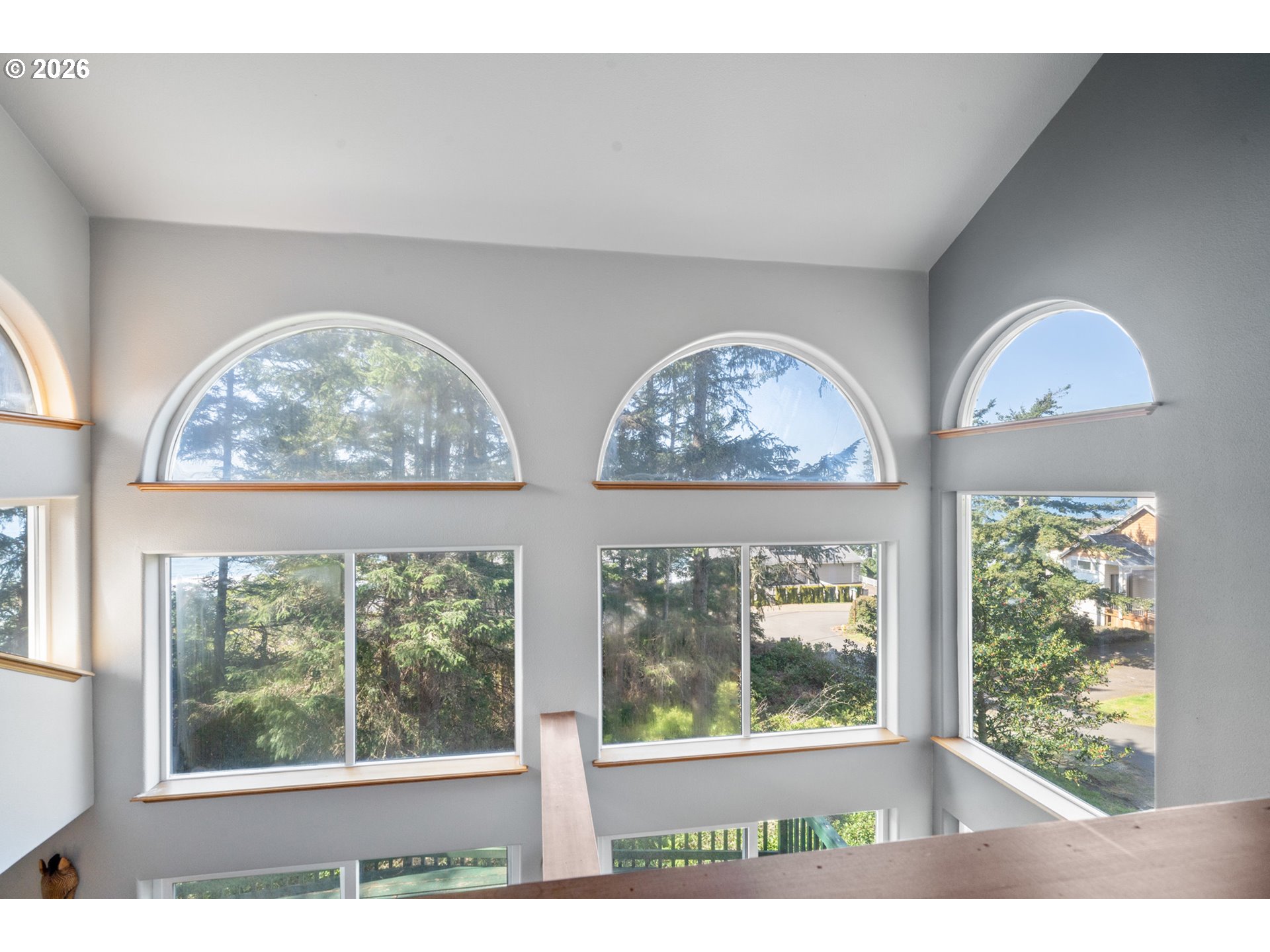 6095 Huckleberry Lane Oceanside, OR 97141 - Photo 20 of 48 a front view of a house with garden