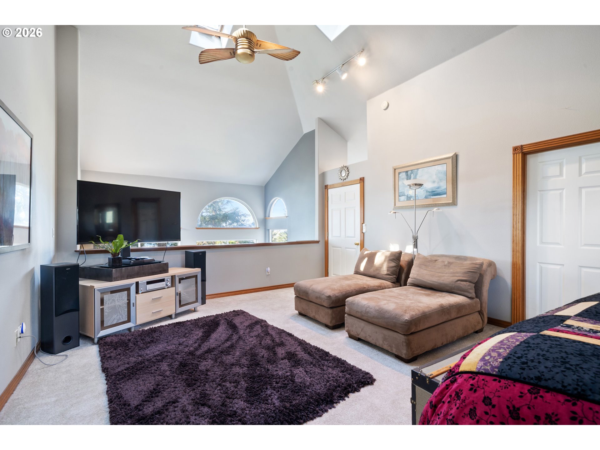 6095 Huckleberry Lane Oceanside, OR 97141 - Photo 22 of 48 a living room with furniture and a flat screen tv