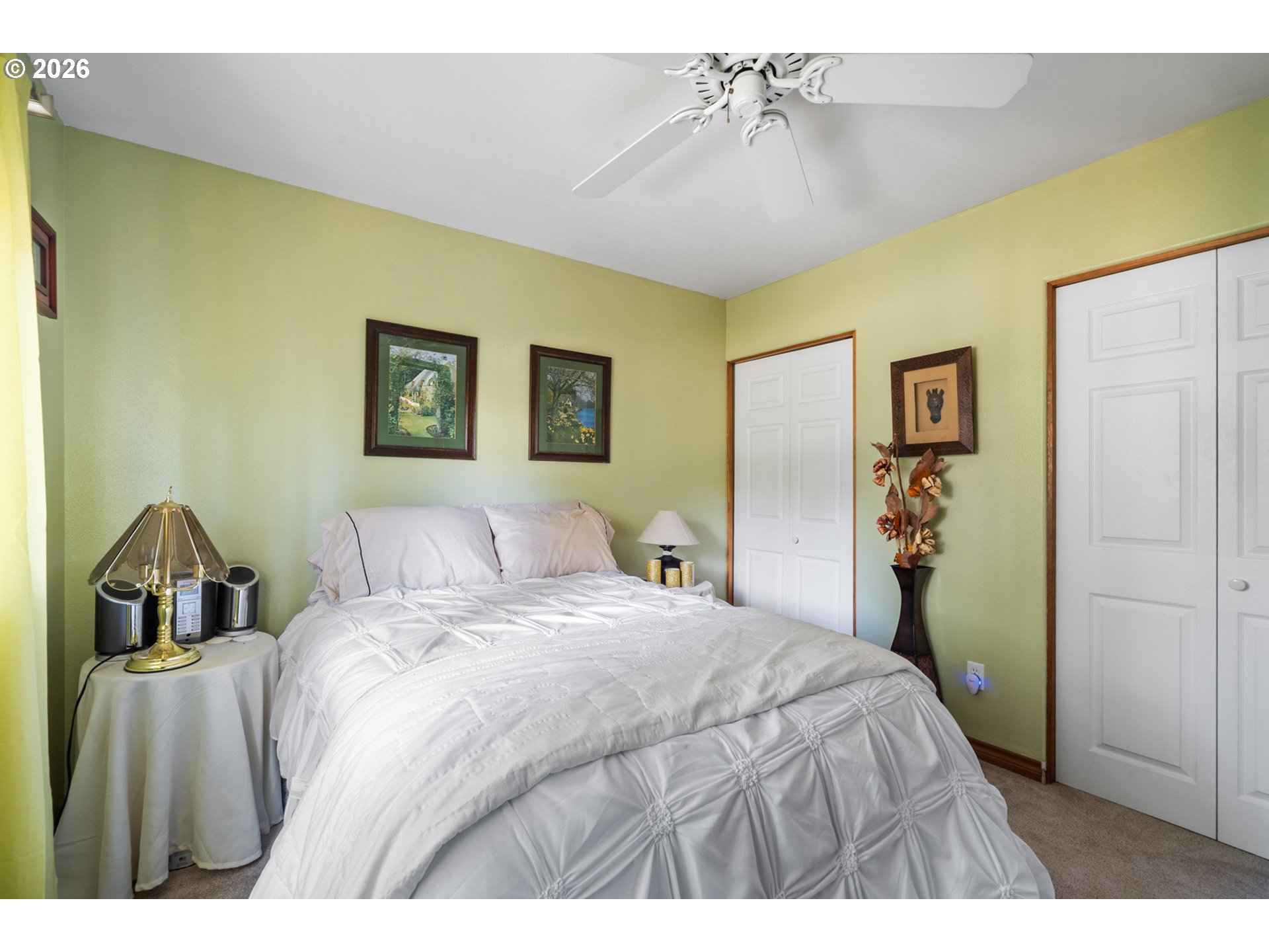 6095 Huckleberry Lane Oceanside, OR 97141 - Photo 29 of 48 a bedroom with a bed and a dresser