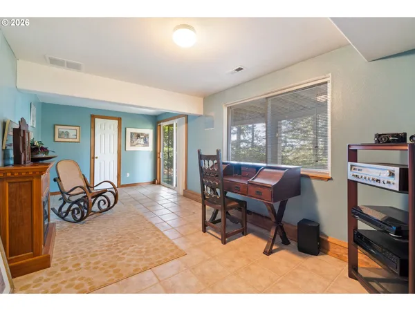 a bathroom with a sink a mirror and cabinets