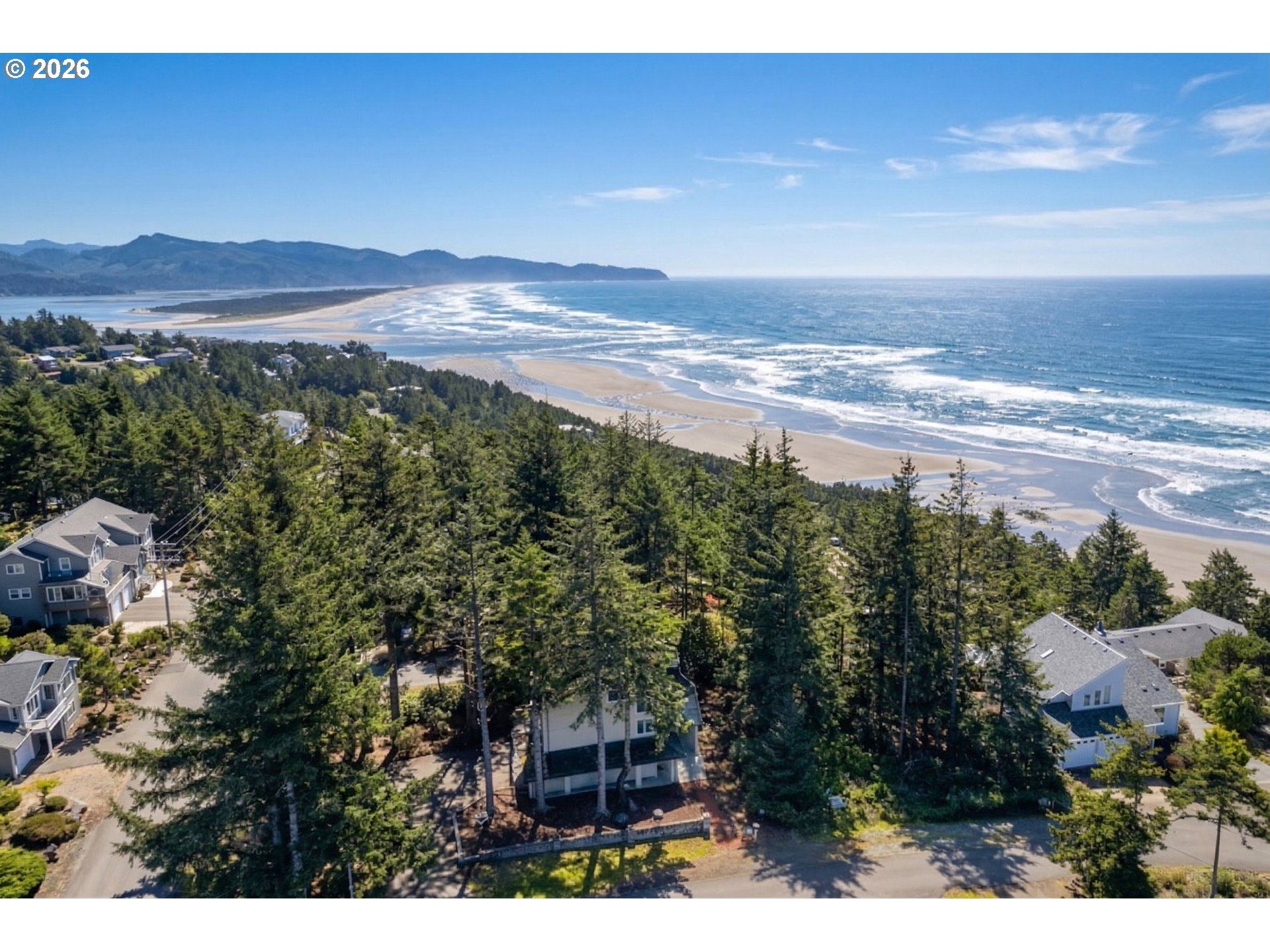 6095 Huckleberry Lane Oceanside, OR 97141 - Photo 43 of 48 a view of an ocean and a mountain