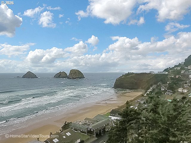 6095 Huckleberry Lane Oceanside, OR 97141 - Photo 46 of 48 a view of a lake with a mountain