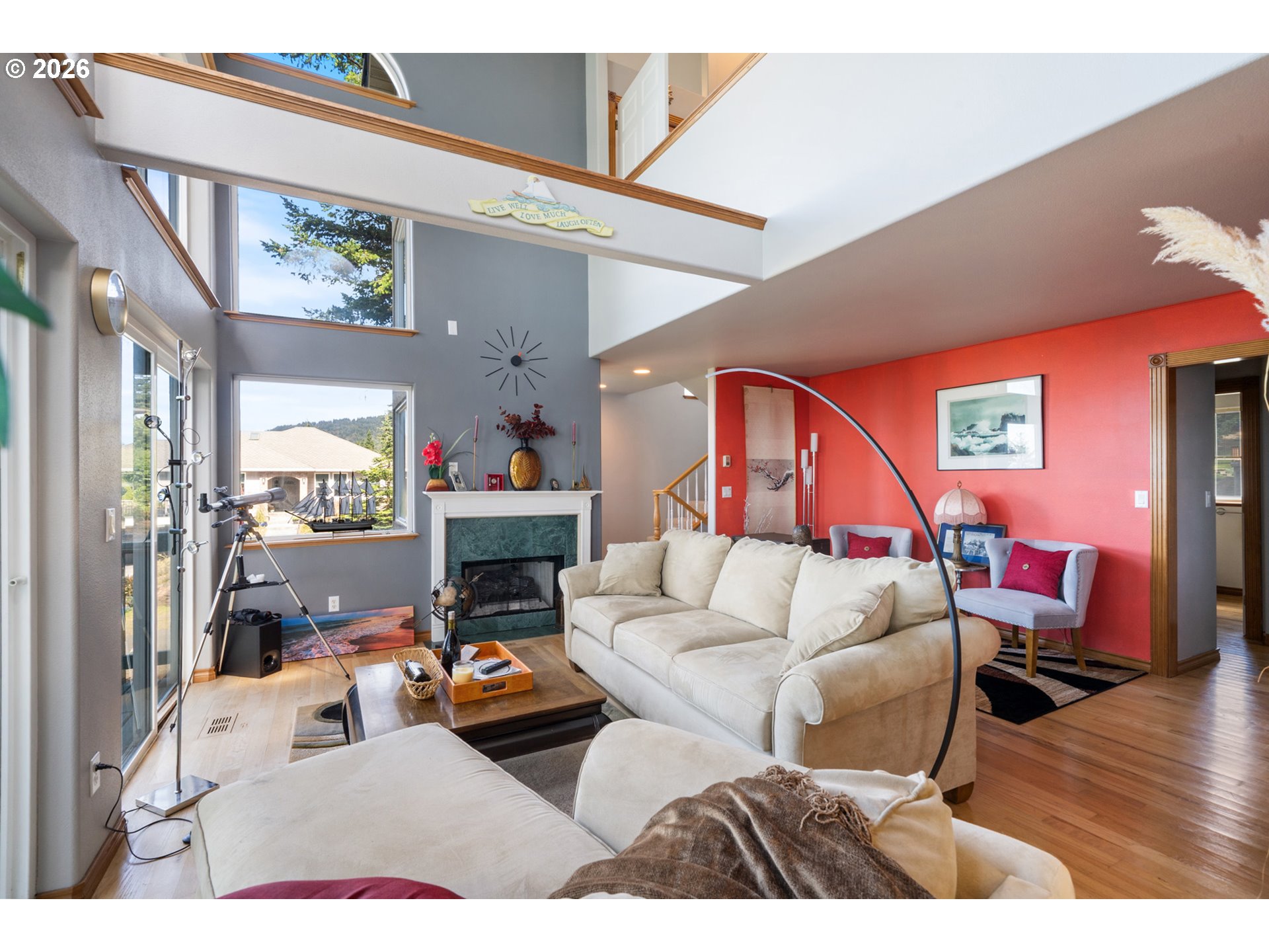 6095 Huckleberry Lane Oceanside, OR 97141 - Photo 7 of 48 a living room with furniture and a fireplace