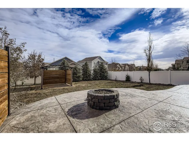 a view of a backyard of the house