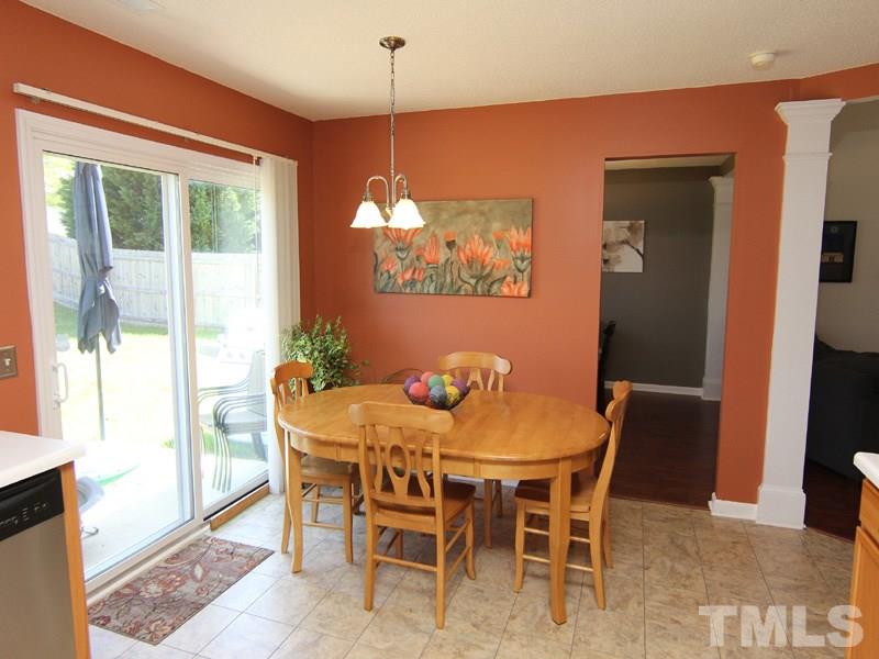 4822 Shallowbrook Trail Raleigh, NC 27616 - Photo 12 of 23 Plenty of room for the family to dine casually. You can sit at the table and see the backyard.