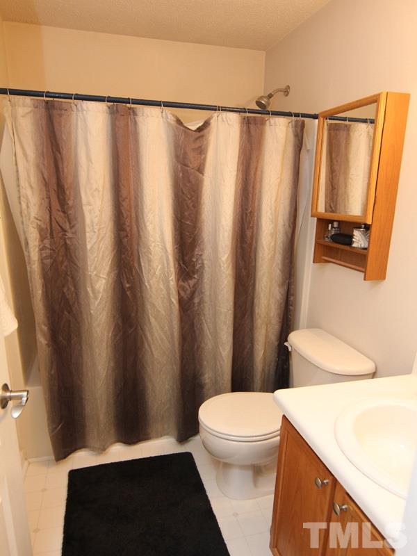 4822 Shallowbrook Trail Raleigh, NC 27616 - Photo 17 of 23 The hall bathroom