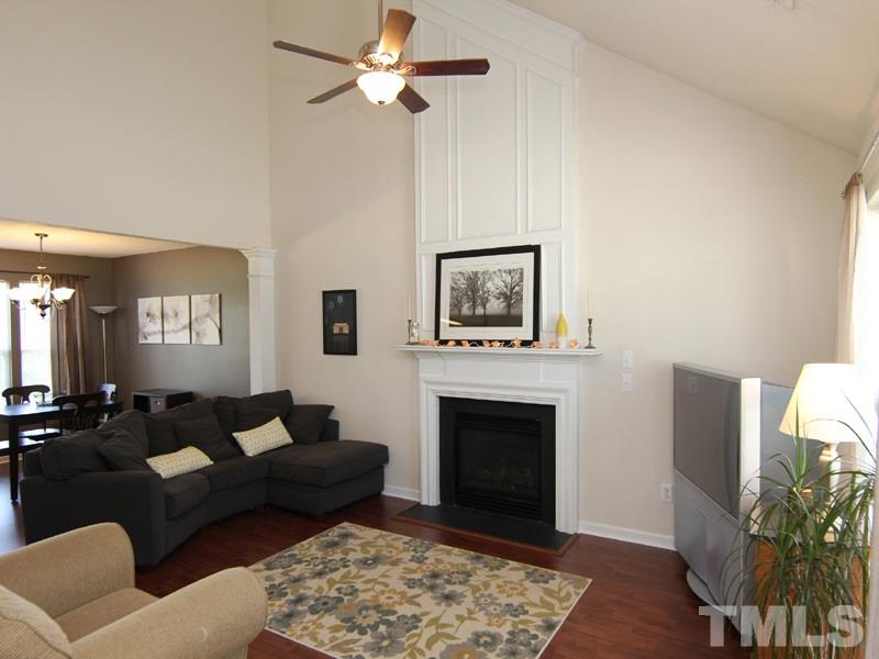 4822 Shallowbrook Trail Raleigh, NC 27616 - Photo 3 of 23 The vaulted ceiling in the great room plus the detailed trim above the fireplace make this room appear huge, yet cozy.