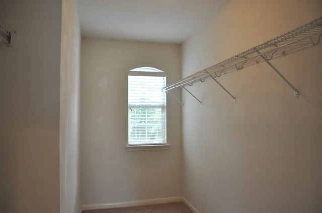 a view of a room with a window