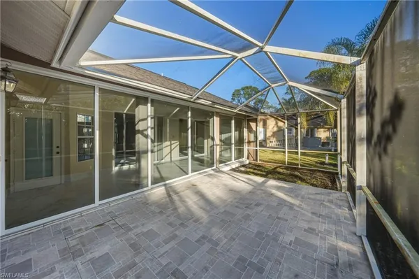 a view of a house with backyard and garden