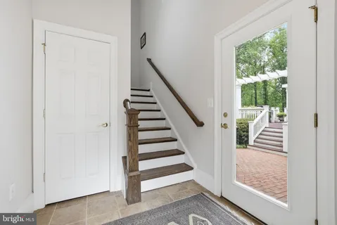 a kitchen with stainless steel appliances granite countertop a stove and a microwave
