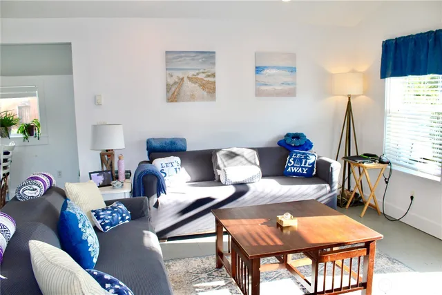 a room with furniture and a window