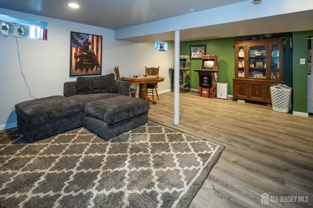 a living room with furniture and window