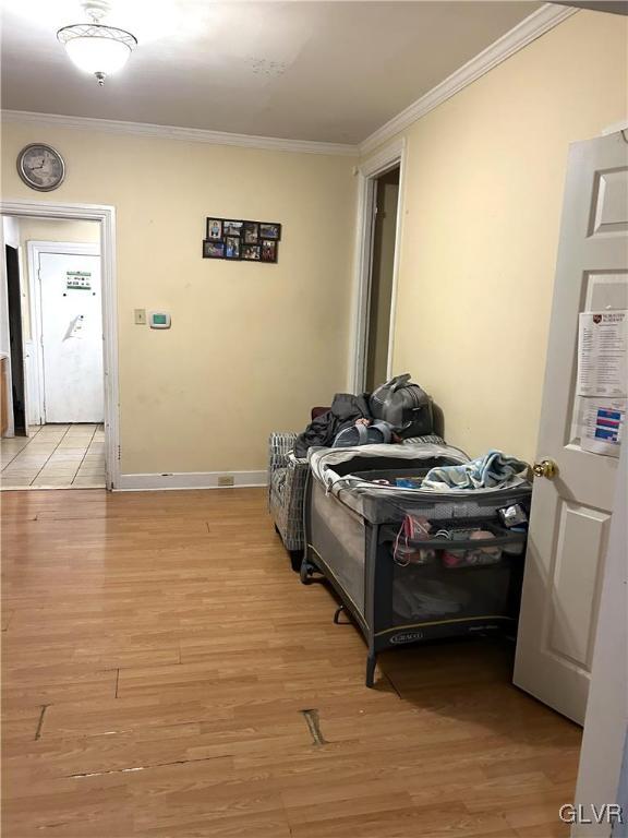 32 West Raspberry Street Bethlehem, PA 18018 - Photo 3 of 10 a bed sitting in a kitchen next to a window