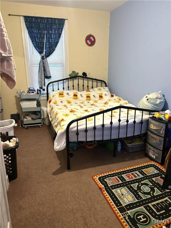 32 West Raspberry Street Bethlehem, PA 18018 - Photo 7 of 10 a bedroom with furniture and a rug
