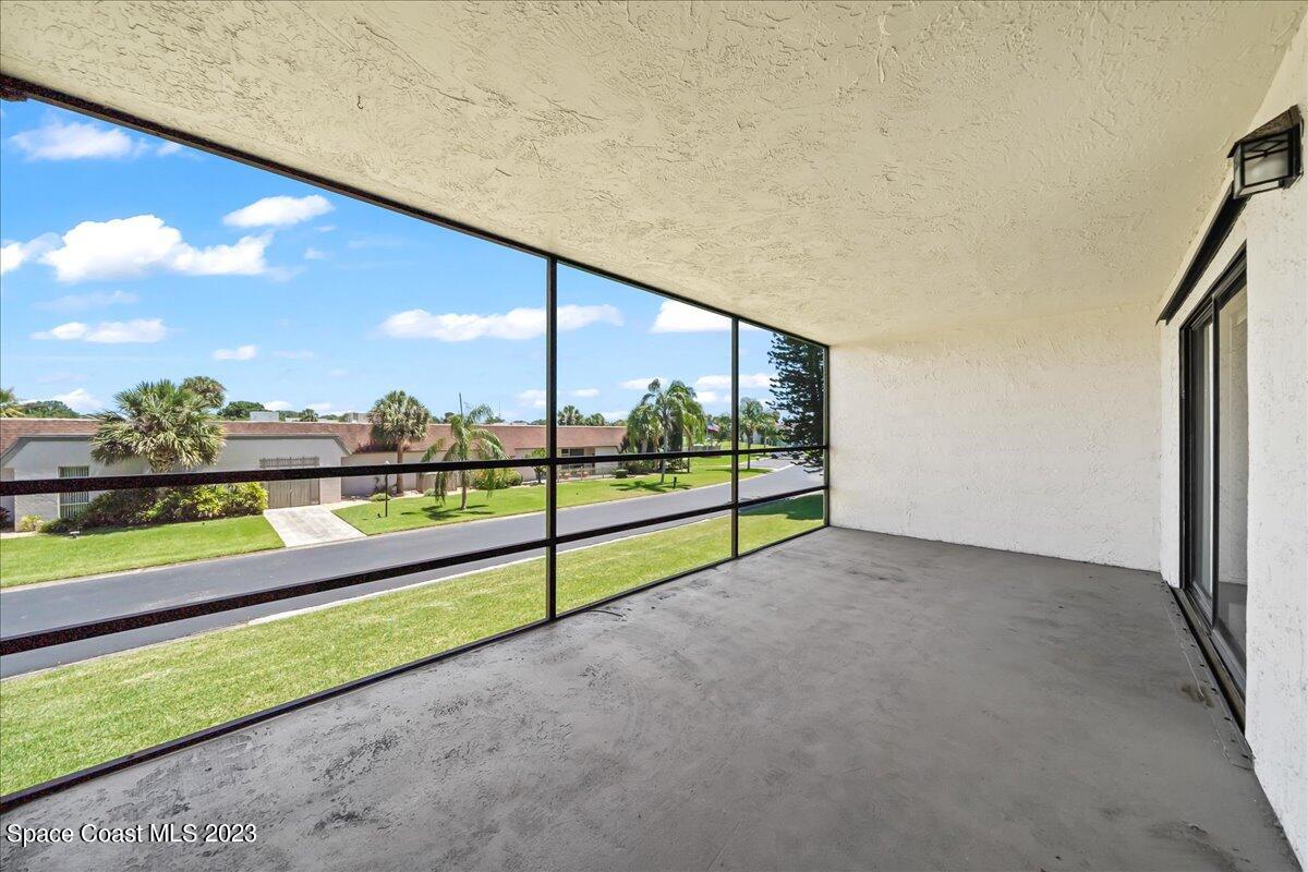 2775 North Wickham Road, Unit 204 Melbourne, FL 32935 - Photo 20 of 24 a view of an empty room with a large window