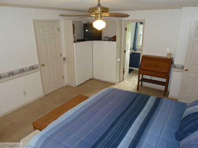 Master Bedroom. Nice sized master with built in shelves and cabinets.