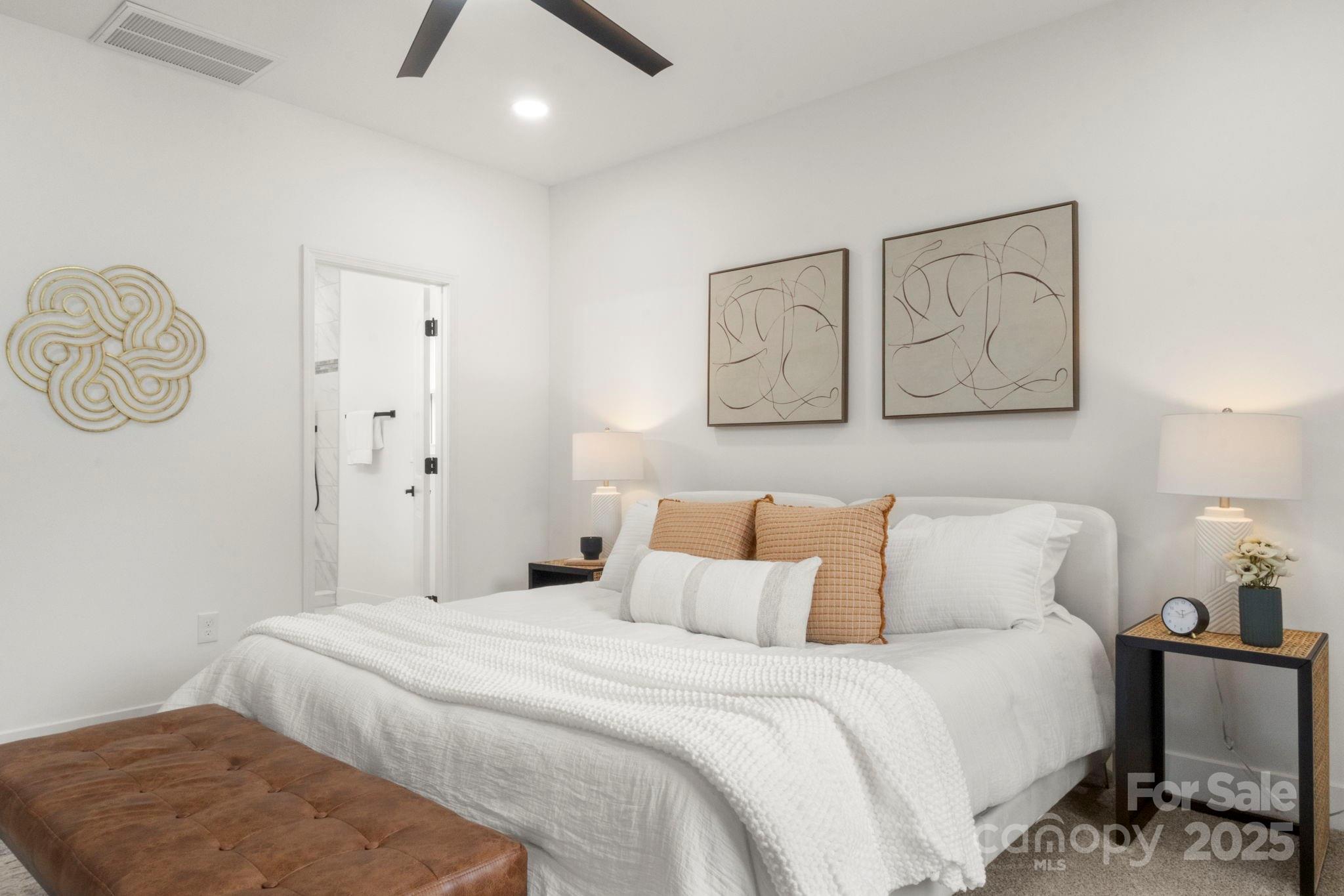 614 Hardin Road Dallas, NC 28034 - Photo 16 of 37 a bedroom with a bed and painting on the wall