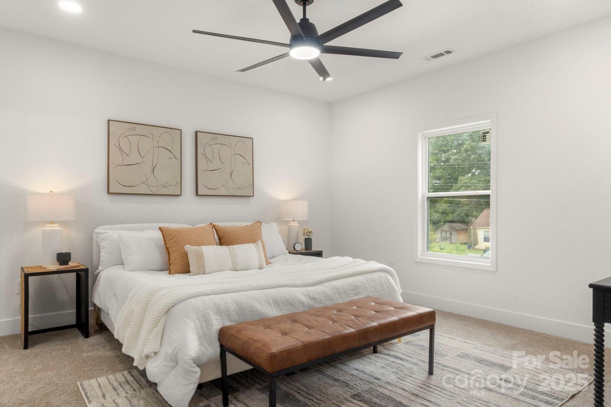 614 Hardin Road Dallas, NC 28034 - Photo 17 of 37 a bedroom with a bed and a window