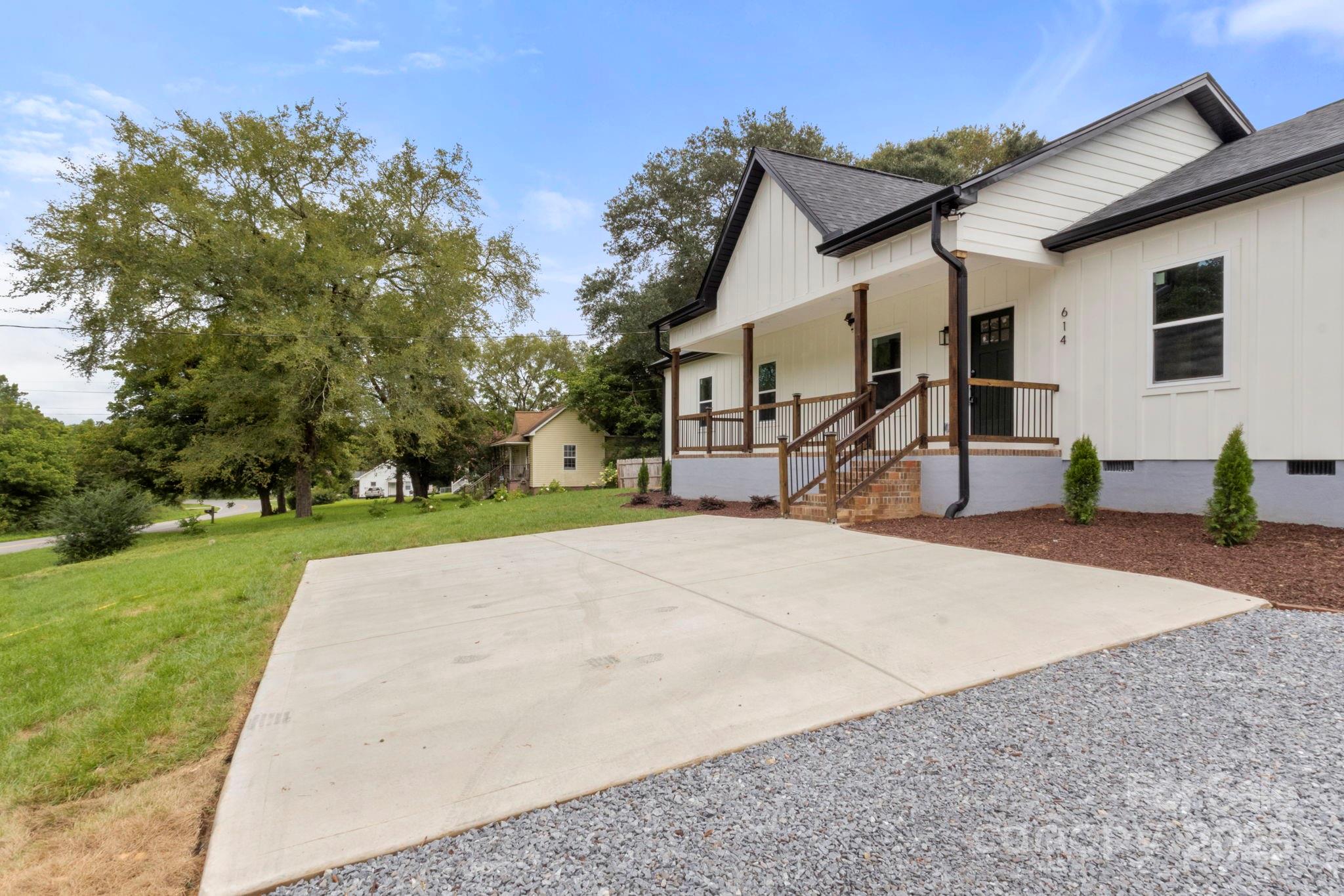 614 Hardin Road Dallas, NC 28034 - Photo 2 of 37 a house with yard in front of it