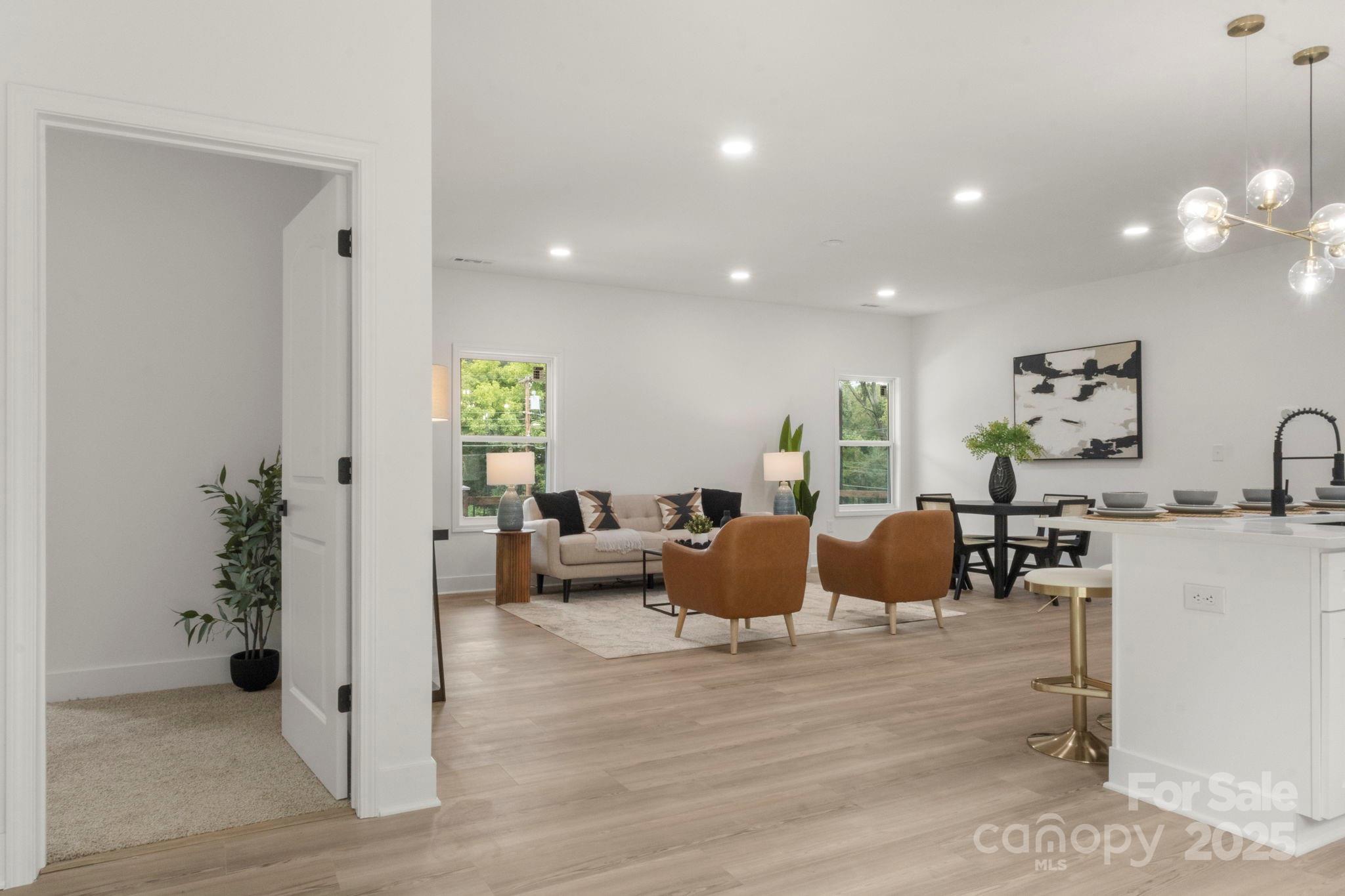 614 Hardin Road Dallas, NC 28034 - Photo 27 of 37 a living room with furniture window and wooden floor