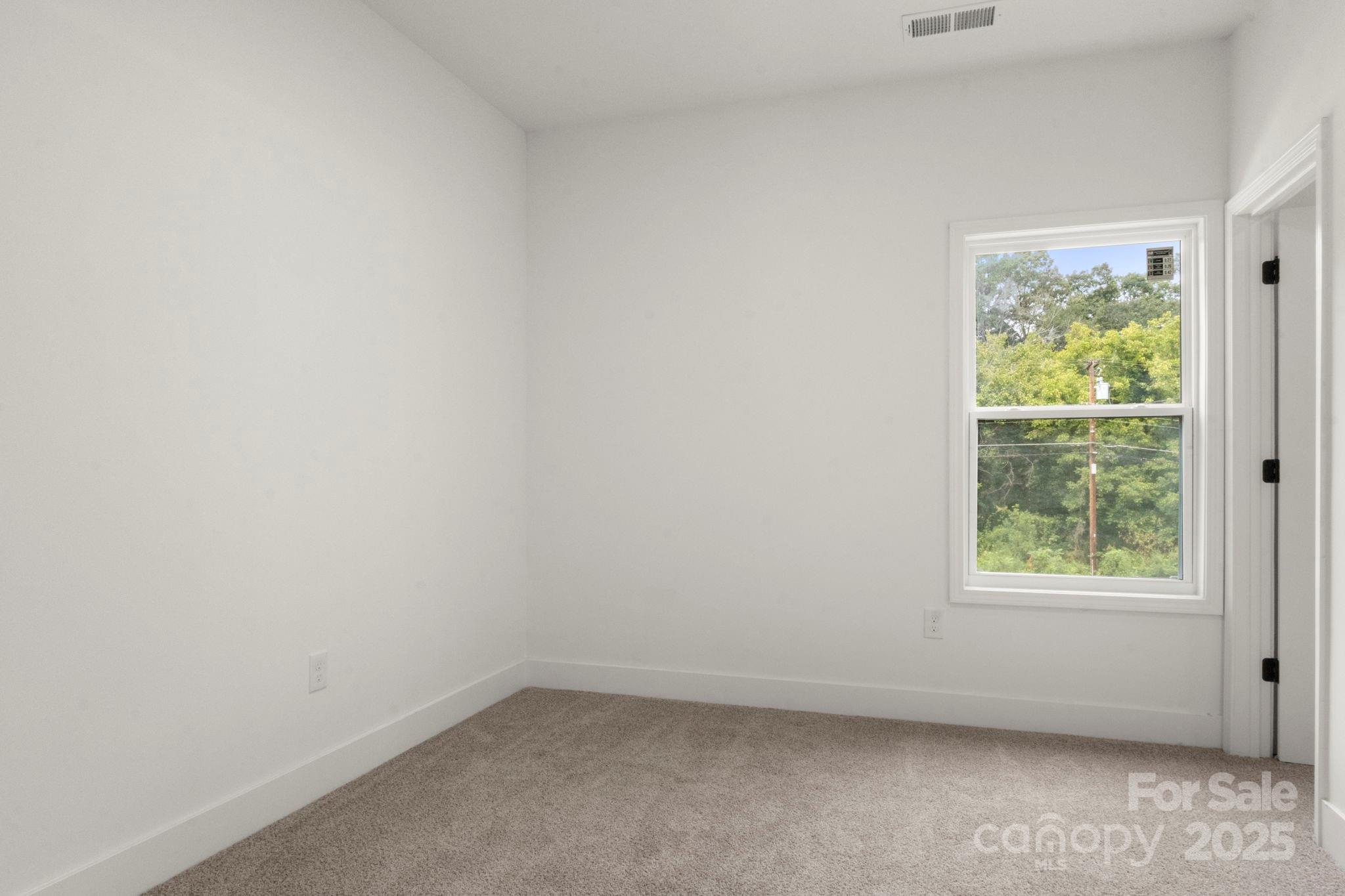 614 Hardin Road Dallas, NC 28034 - Photo 28 of 37 an empty room with a window
