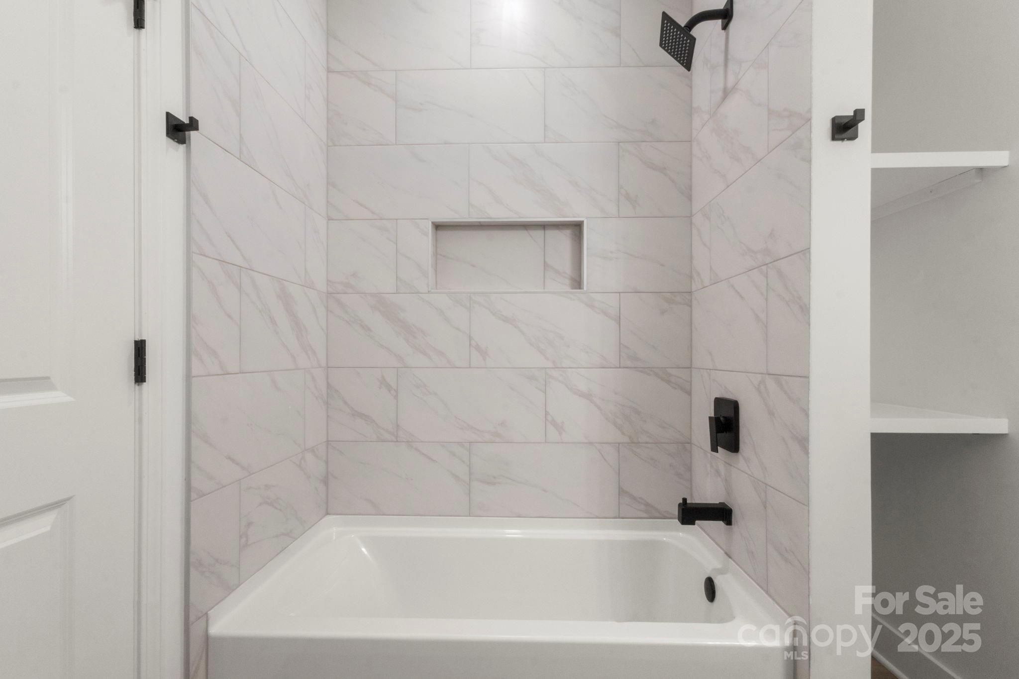 614 Hardin Road Dallas, NC 28034 - Photo 31 of 37 a bathroom with a bathtub