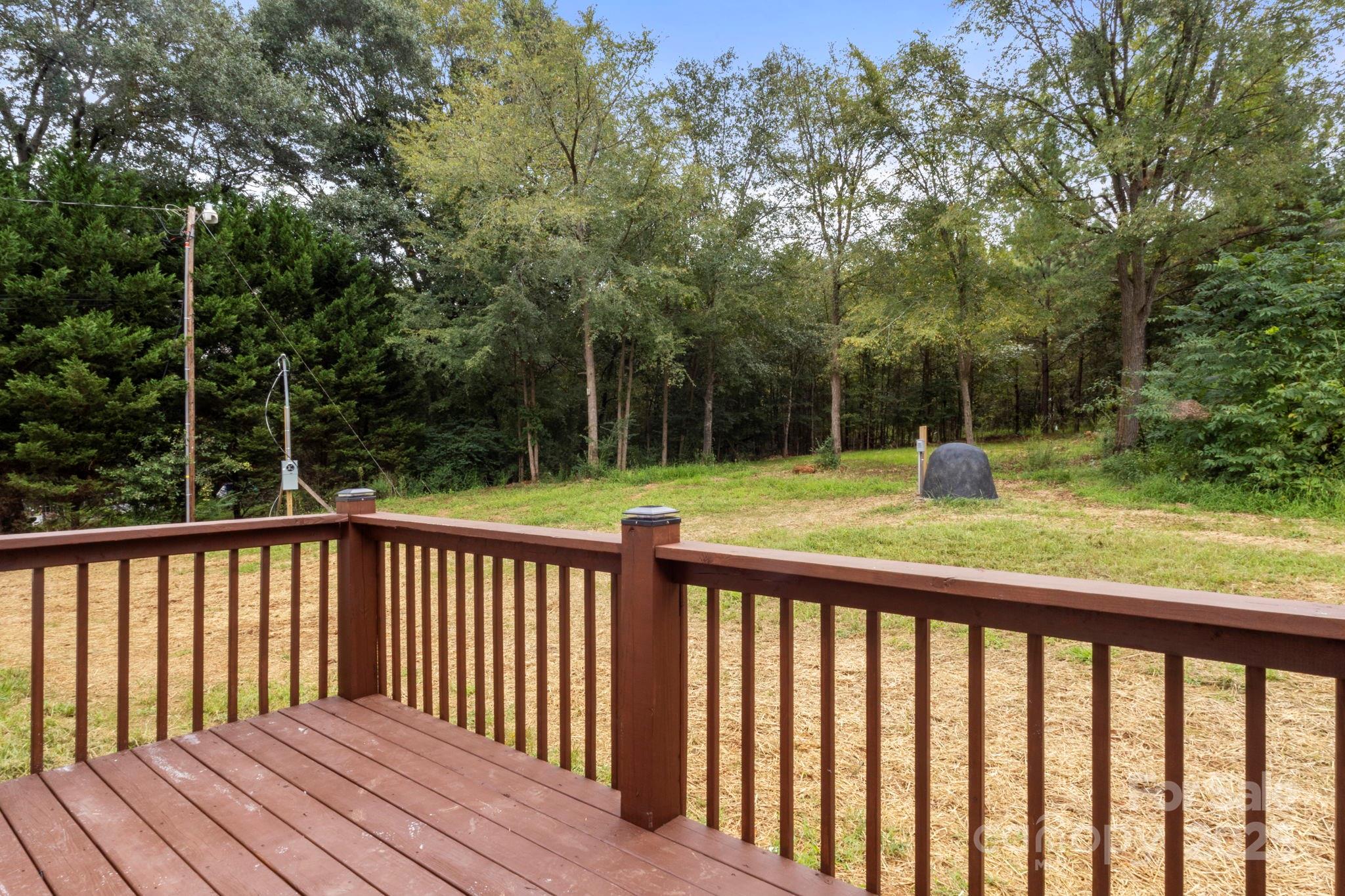 614 Hardin Road Dallas, NC 28034 - Photo 35 of 37 a view of a wooden deck