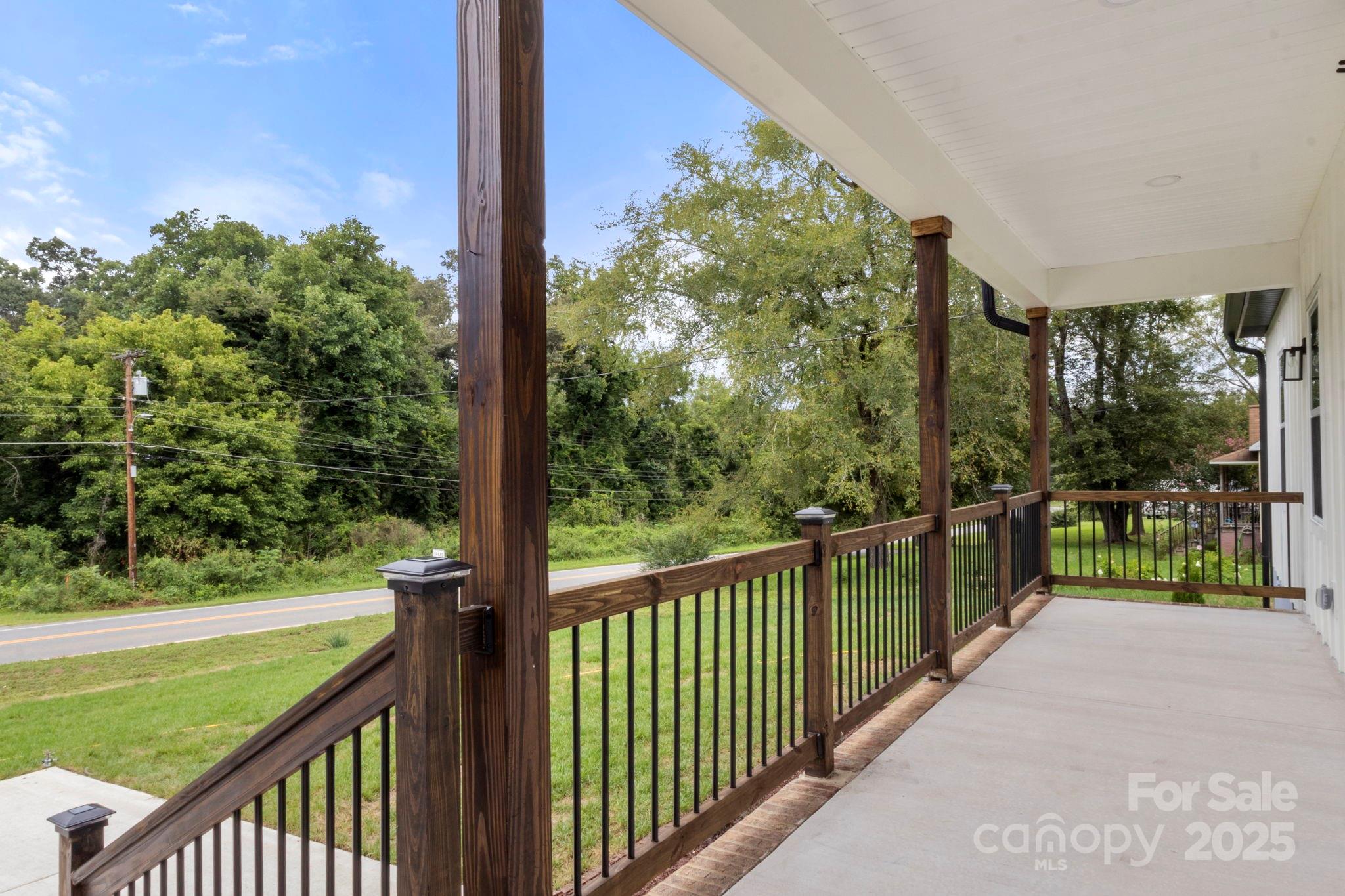 614 Hardin Road Dallas, NC 28034 - Photo 6 of 37 a view of a porch