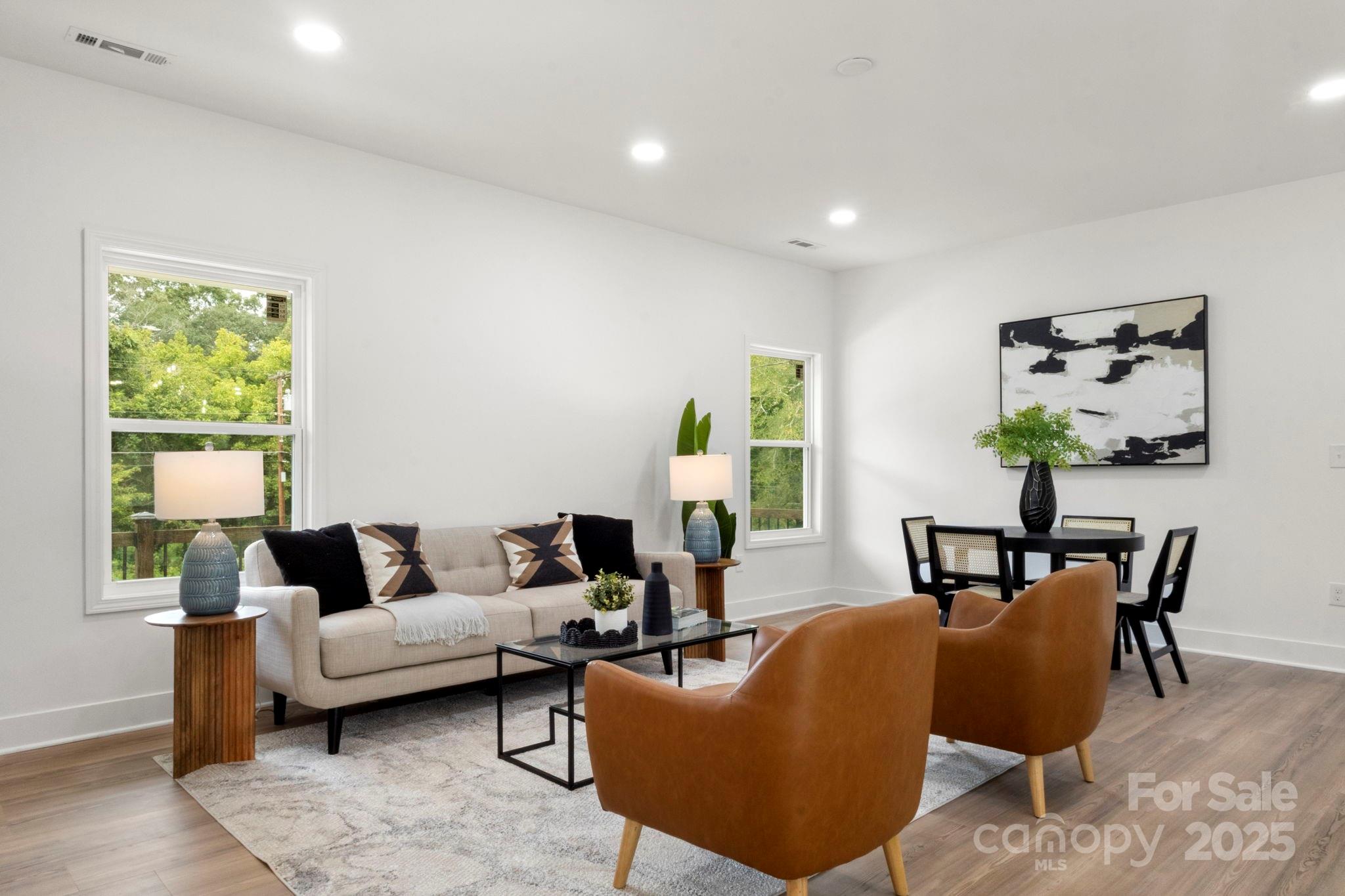 614 Hardin Road Dallas, NC 28034 - Photo 8 of 37 a living room with furniture and a potted plant
