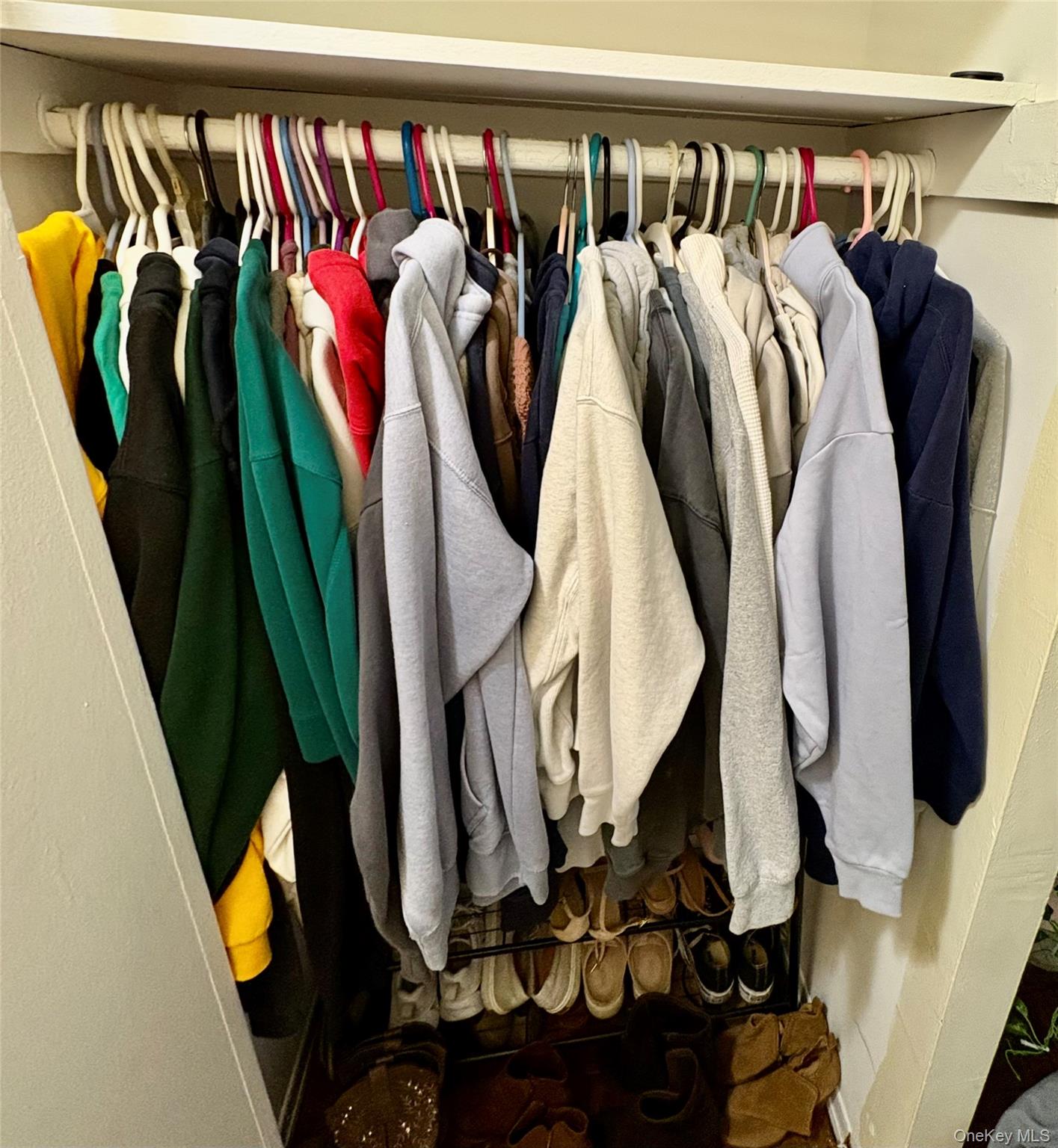 465 Shore Road Long Beach, NY 11561 - Photo 15 of 20 a view of walk in closet with clothes and shoes