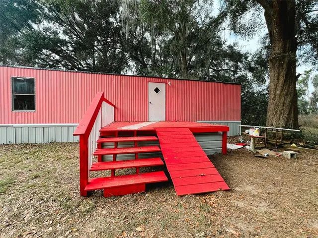 a view of backyard with green space