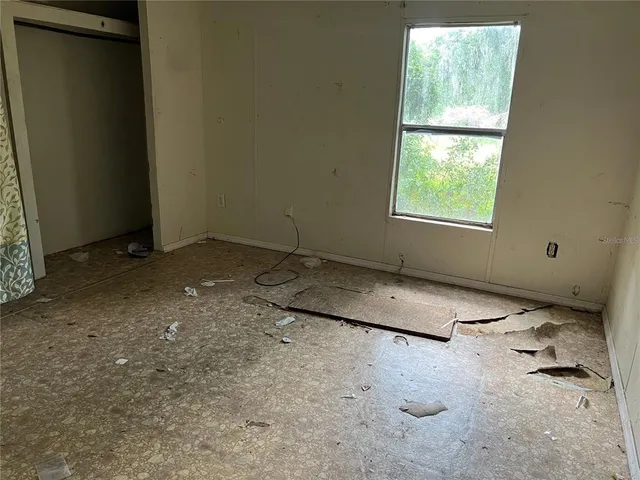 an empty room with windows