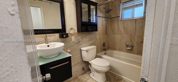 1 Northeast 78th Street, Unit 9 Miami, FL 33138 - Photo 4 of 4 a bathroom with a sink a toilet and shower
