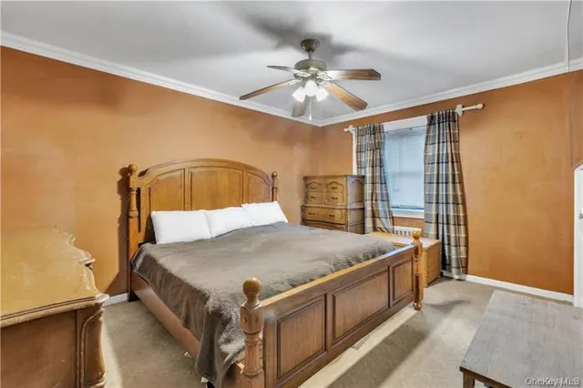 a bed room with a bed and a chandelier