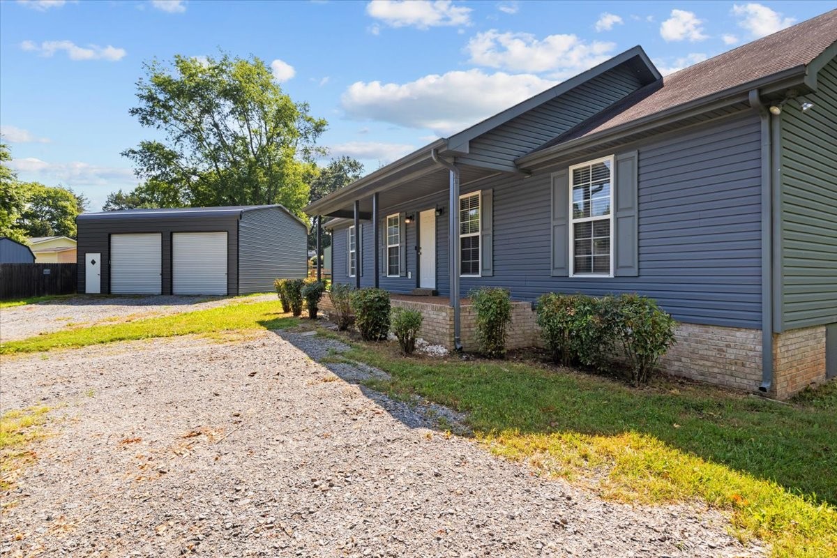 7173 New Hope Road Fairview, TN 37062 - Photo 2 of 31 a view of a house with a swimming pool