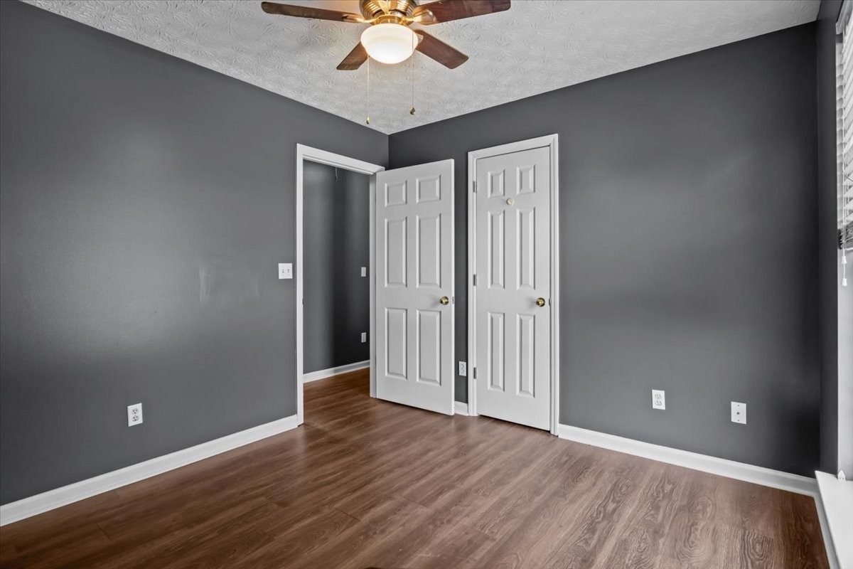7173 New Hope Road Fairview, TN 37062 - Photo 21 of 31 a view of an empty room with wooden floor