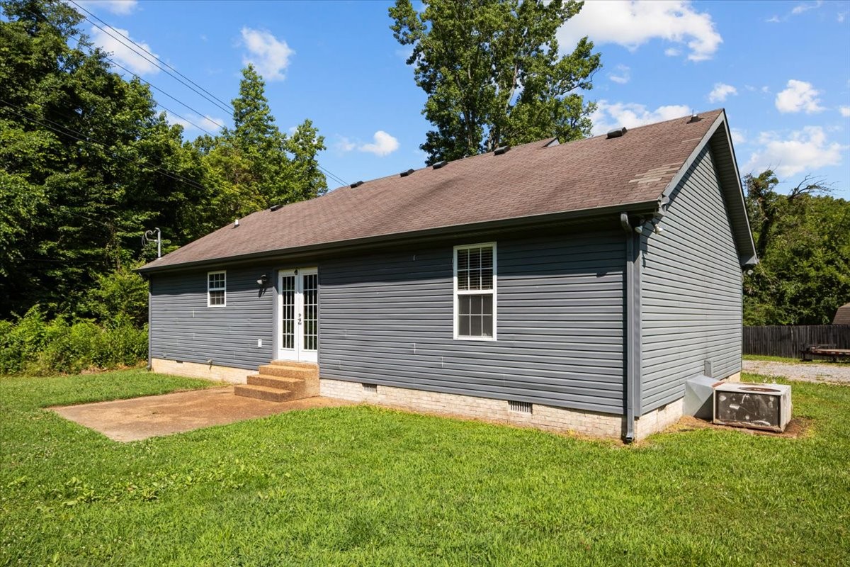 7173 New Hope Road Fairview, TN 37062 - Photo 27 of 31 a view of a house with a yard