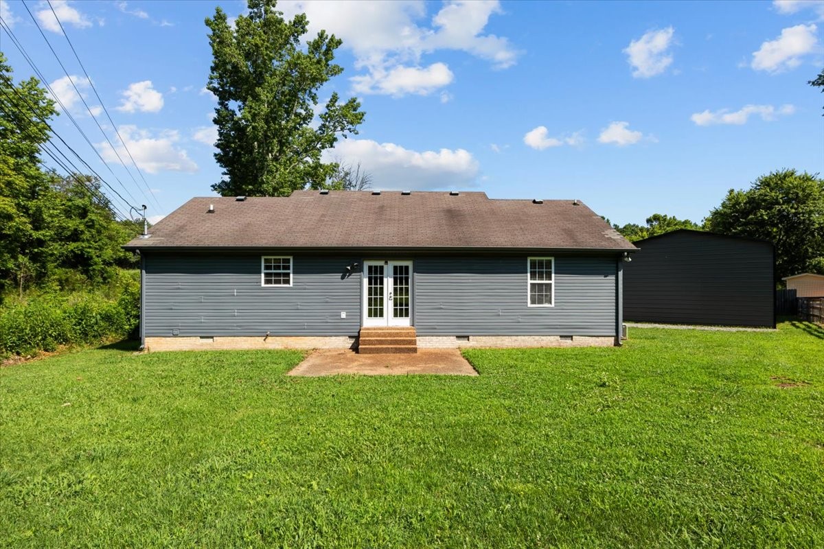 7173 New Hope Road Fairview, TN 37062 - Photo 30 of 31 a view of a house with a yard