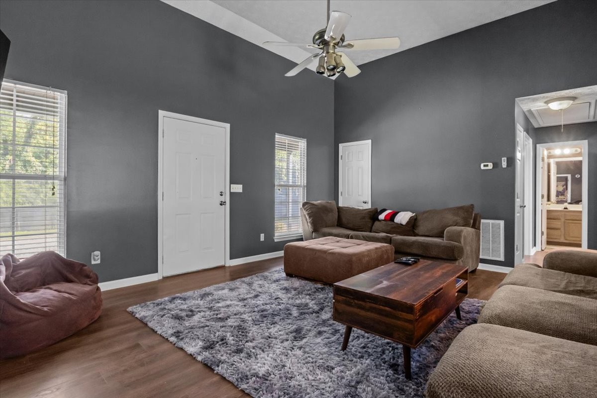 7173 New Hope Road Fairview, TN 37062 - Photo 6 of 31 a living room with furniture a rug and a window