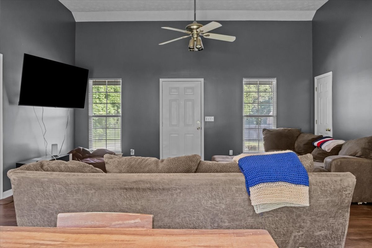 7173 New Hope Road Fairview, TN 37062 - Photo 8 of 31 a living room with furniture ceiling fan and a window