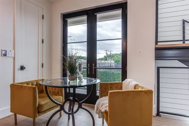 a kitchen with a sink a counter space appliances and cabinets