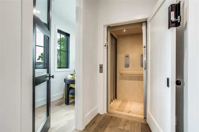 a dining room with furniture and windows