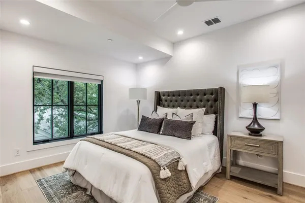 a view of entryway with livingroom and wooden floor